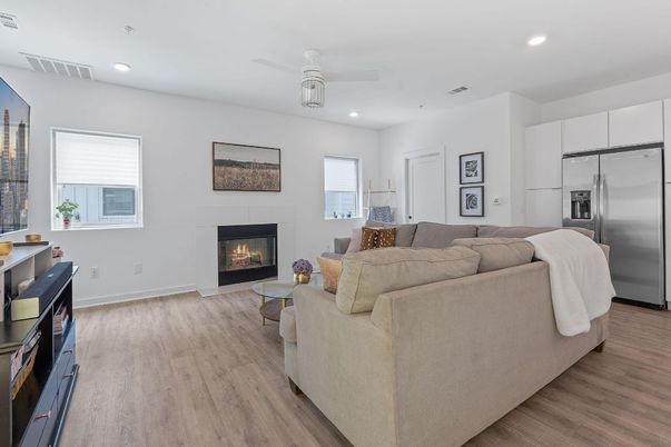 Fireplace, Interior, Kitchen, Living room, Recessed Lighting, Stainless Steel Appliances, Wood Texture Flooring