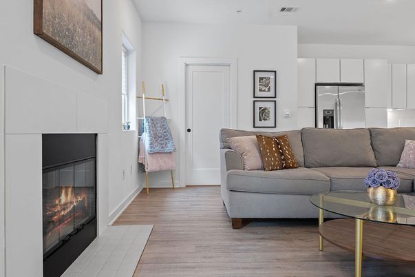 Fireplace, Interior, Kitchen, Living room, Recessed Lighting, Stainless Steel Appliances, Wood Texture Flooring