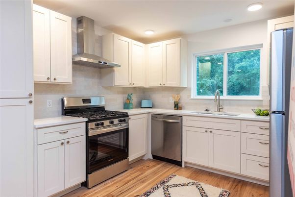 Interior, Kitchen, Recessed Lighting, Stainless Steel Appliances, Wood Texture Flooring