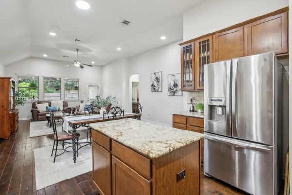 Dining room, Interior, Kitchen, Living room, Recessed Lighting, Stainless Steel Appliances, Wood Texture Flooring