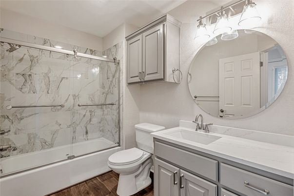 Bathroom, Glass Shower, Interior, Marble Walls, Wood Texture Flooring