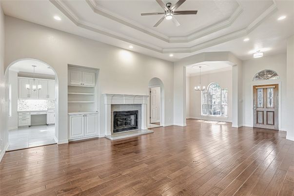Empty room, Fireplace, Interior, Pendant Lights, Recessed Lighting, Wood Texture Flooring