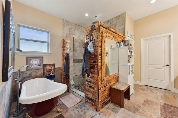 Bathroom, Free Standing Baths, Interior, Recessed Lighting, Stone Walls