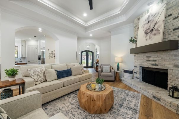 Fireplace, Interior, Living room, Recessed Lighting, Stone Walls, Wood Texture Flooring