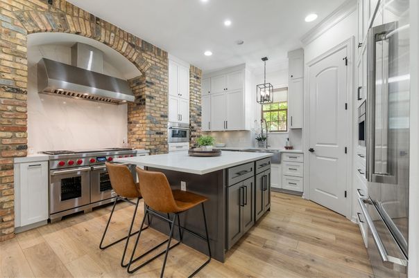 Interior, Kitchen, Pendant Lights, Recessed Lighting, Stainless Steel Appliances, Stone Walls, Wood Texture Flooring