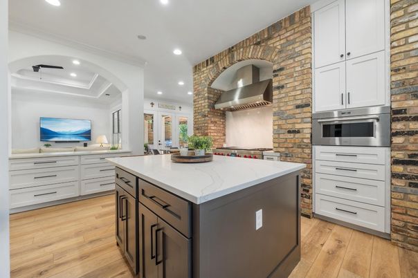 Interior, Kitchen, Recessed Lighting, Stainless Steel Appliances, Stone Walls, Wood Texture Flooring