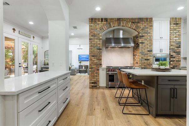 Interior, Kitchen, Pendant Lights, Recessed Lighting, Stainless Steel Appliances, Stone Walls, Wood Texture Flooring
