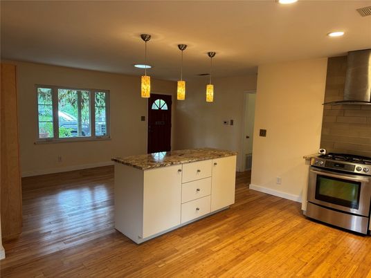 Interior, Kitchen, Pendant Lights, Recessed Lighting, Stainless Steel Appliances, Wood Texture Flooring