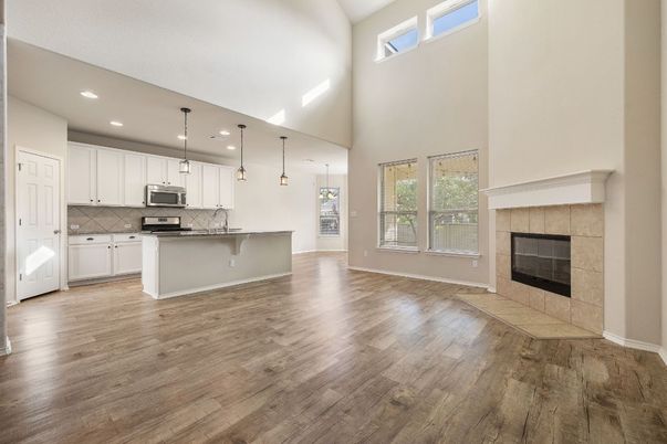Fireplace, Interior, Kitchen, Pendant Lights, Recessed Lighting, Wood Texture Flooring