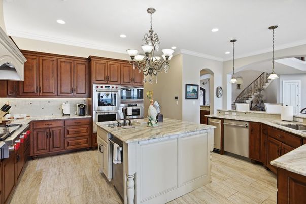 Chandelier, Interior, Kitchen, Pendant Lights, Recessed Lighting, Stainless Steel Appliances, Wood Texture Flooring