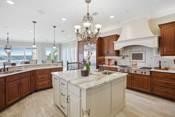 Chandelier, Interior, Kitchen, Pendant Lights, Recessed Lighting, Stainless Steel Appliances, Water, Wood Texture Flooring