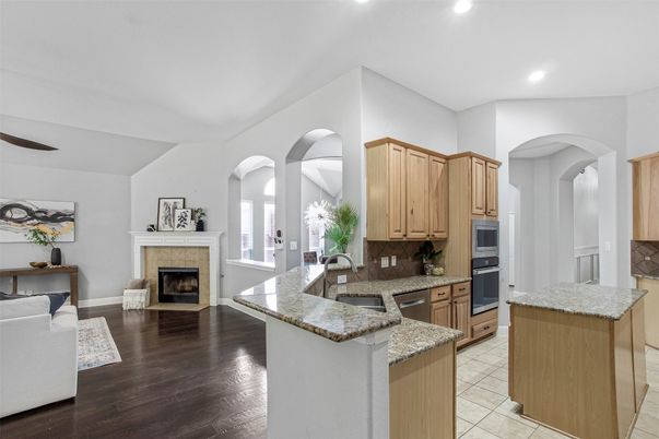 Fireplace, Interior, Kitchen, Recessed Lighting, Wood Texture Flooring