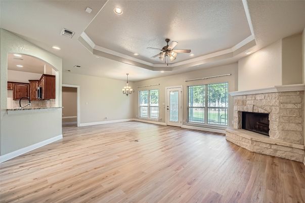 Chandelier, Empty room, Fireplace, Interior, Recessed Lighting, Wood Texture Flooring