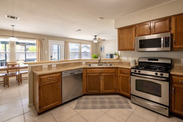 Dining room, Interior, Kitchen, Pendant Lights, Stainless Steel Appliances