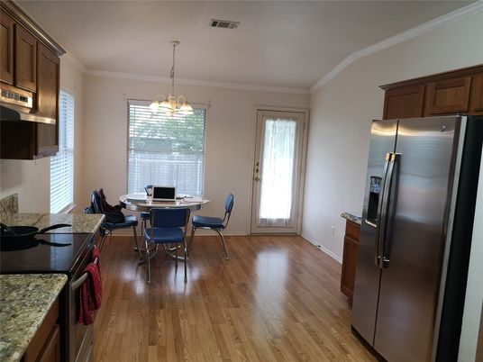 Dining room, Interior, Kitchen, Pendant Lights, Stainless Steel Appliances, Wood Texture Flooring