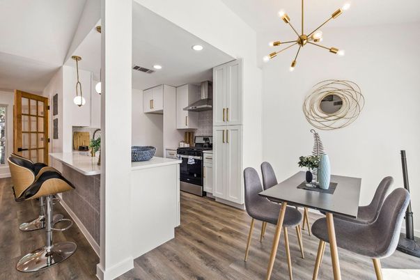 Dining room, Interior, Kitchen, Pendant Lights, Recessed Lighting, Stainless Steel Appliances, Wood Texture Flooring