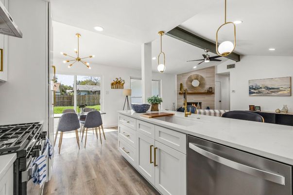 Dining room, Fireplace, Interior, Kitchen, Pendant Lights, Recessed Lighting, Stainless Steel Appliances, Wood Texture Flooring