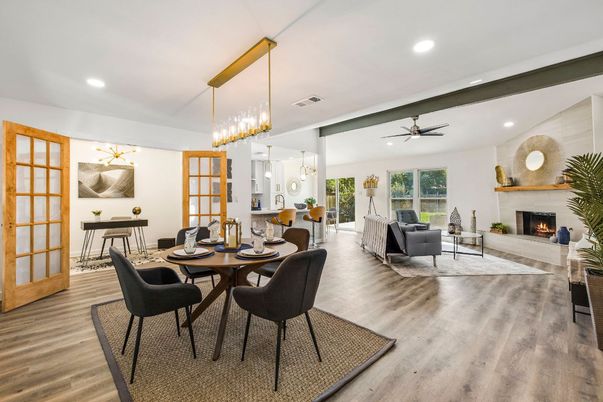 Chandelier, Dining room, Fireplace, Interior, Living room, Pendant Lights, Recessed Lighting, Wood Texture Flooring