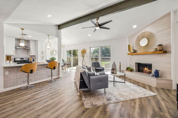Fireplace, Interior, Kitchen, Living room, Pendant Lights, Recessed Lighting, Stainless Steel Appliances, Wood Texture Flooring