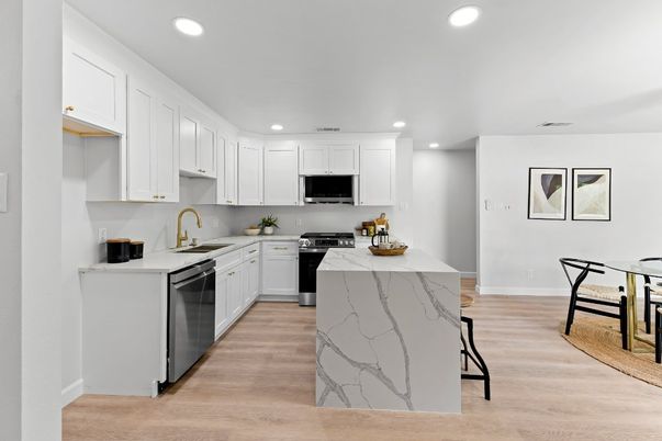 Dining room, Interior, Kitchen, Recessed Lighting, Stainless Steel Appliances, Wood Texture Flooring