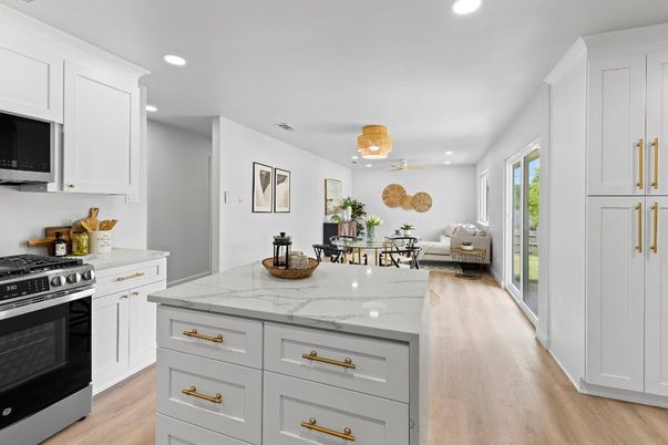 Dining room, Interior, Kitchen, Pendant Lights, Recessed Lighting, Stainless Steel Appliances, Wood Texture Flooring