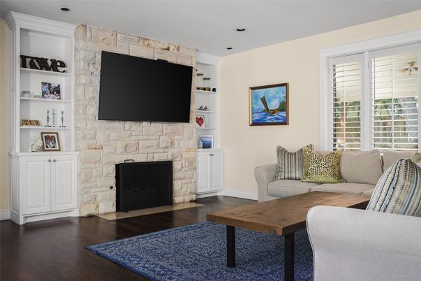 Fireplace, Interior, Living room, Recessed Lighting, Stone Walls, Wood Texture Flooring