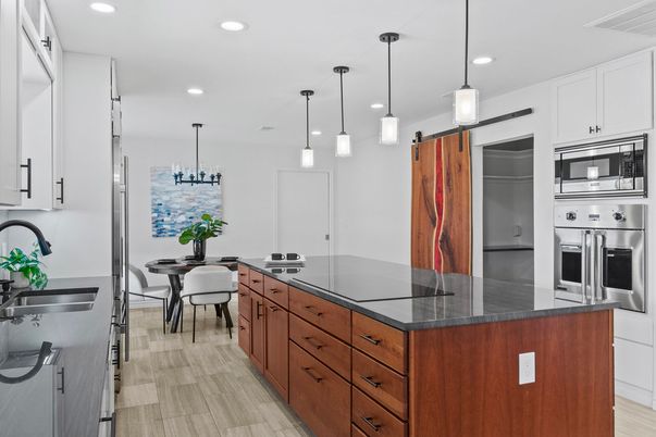 Dining room, Interior, Kitchen, Pendant Lights, Recessed Lighting, Stainless Steel Appliances, Wood Texture Flooring