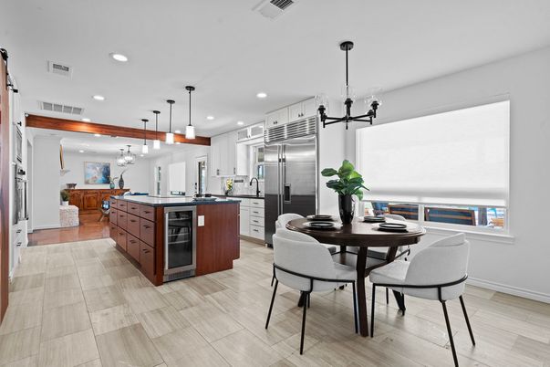 Dining room, Interior, Kitchen, Pendant Lights, Recessed Lighting, Stainless Steel Appliances, Wood Texture Flooring