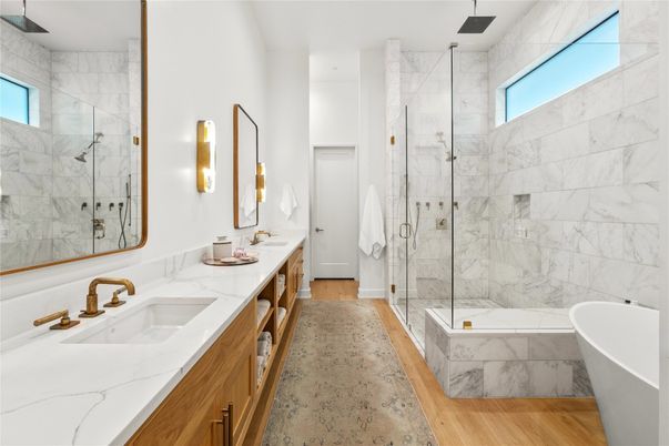 Bathroom, Dual Sink Vanities, Free Standing Baths, Glass Shower, Interior, Marble Walls, Wood Texture Flooring