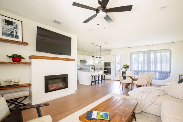 Dining room, Fireplace, Interior, Kitchen, Living room, Pendant Lights, Recessed Lighting, Stainless Steel Appliances, Wood Texture Flooring