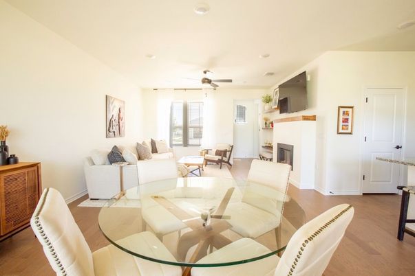 Dining room, Fireplace, Interior, Living room, Recessed Lighting, Wood Texture Flooring