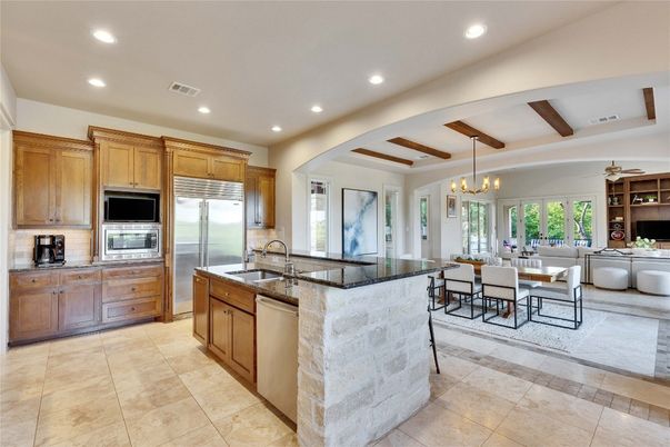 Chandelier, Dining room, Interior, Kitchen, Living room, Pendant Lights, Recessed Lighting, Stainless Steel Appliances, Wooden Beams