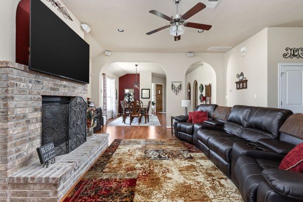 Dining room, Fireplace, Interior, Living room, Pendant Lights, Recessed Lighting, Stone Walls, Wood Texture Flooring