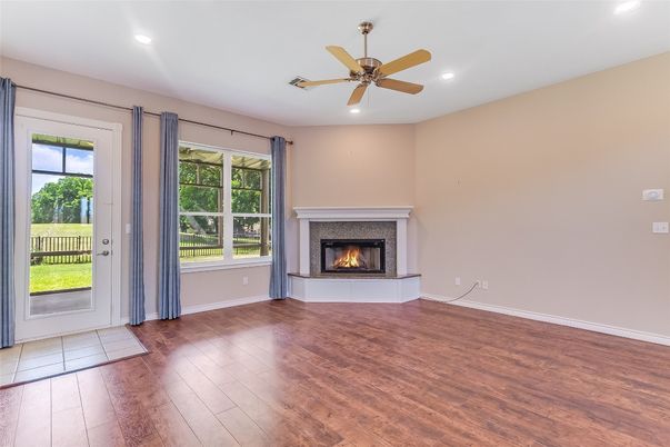 Empty room, Fireplace, Interior, Recessed Lighting, Wood Texture Flooring