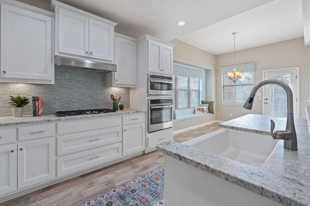 Chandelier, Interior, Kitchen, Pendant Lights, Recessed Lighting, Stainless Steel Appliances, Wood Texture Flooring