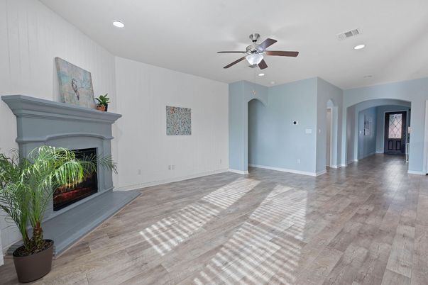 Empty room, Fireplace, Interior, Recessed Lighting, Wood Texture Flooring