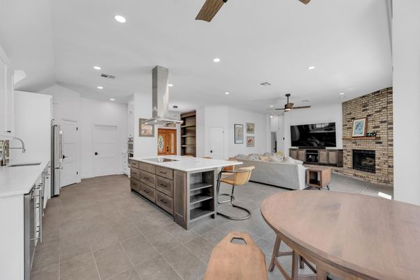 Dining room, Fireplace, Interior, Kitchen, Living room, Recessed Lighting, Stone Walls