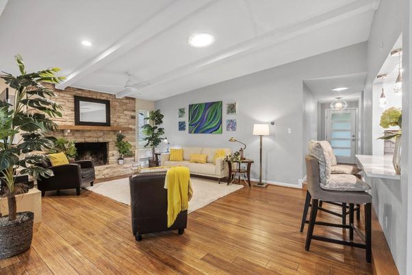Fireplace, Interior, Living room, Recessed Lighting, Stone Walls, Wood Texture Flooring