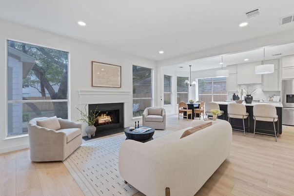 Dining room, Fireplace, Interior, Kitchen, Living room, Pendant Lights, Recessed Lighting, Stainless Steel Appliances, Wood Texture Flooring