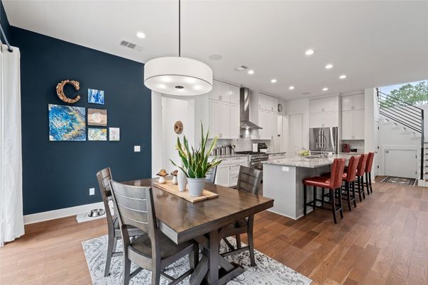 Dining room, Interior, Kitchen, Pendant Lights, Recessed Lighting, Stainless Steel Appliances, Wood Texture Flooring