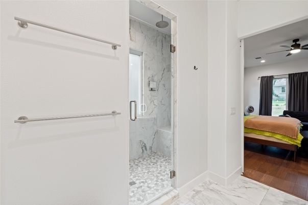 Bathroom, Glass Shower, Interior, Marble, Marble Walls, Recessed Lighting, Wood Texture Flooring