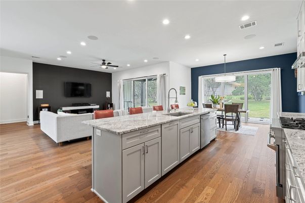 Dining room, Interior, Kitchen, Living room, Pendant Lights, Recessed Lighting, Stainless Steel Appliances, Wood Texture Flooring
