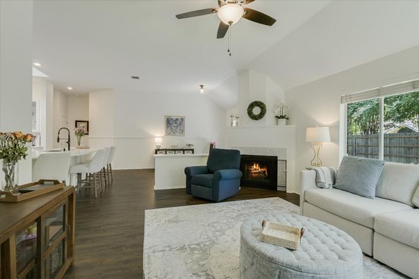 Dining room, Fireplace, Interior, Living room, Recessed Lighting, Wood Texture Flooring