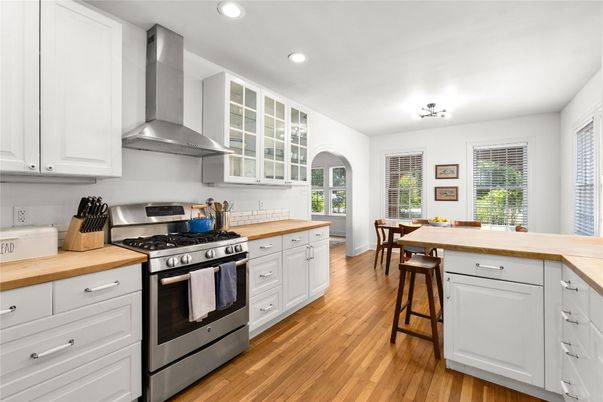 Dining room, Interior, Kitchen, Recessed Lighting, Stainless Steel Appliances, Wood Texture Flooring