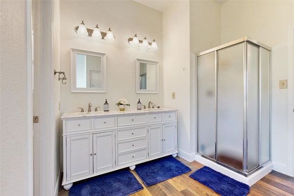 Bathroom, Dual Sink Vanities, Glass Shower, Interior, Wood Texture Flooring