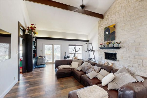 Fireplace, Fitness Equipment, Interior, Living room, Stone Walls, Wooden Beams, Wood Texture Flooring