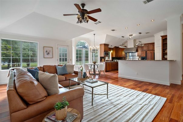 Chandelier, Dining room, Interior, Kitchen, Living room, Recessed Lighting, Stainless Steel Appliances, Wood Texture Flooring