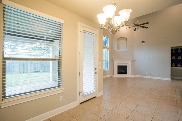 Chandelier, Empty room, Fireplace, Interior
