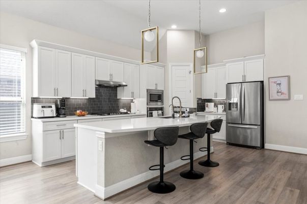 Interior, Kitchen, Pendant Lights, Recessed Lighting, Stainless Steel Appliances, Wood Texture Flooring