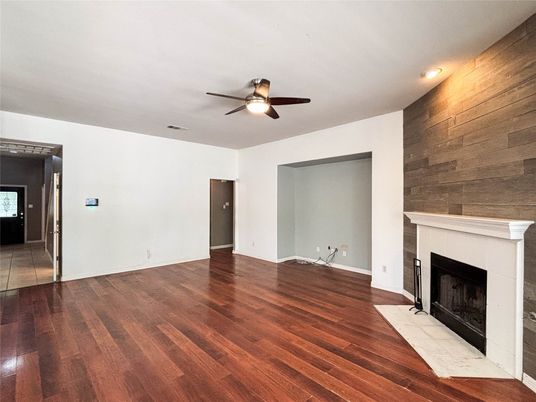 Empty room, Fireplace, Interior, Recessed Lighting, Wood Texture Flooring, Wooden Walls